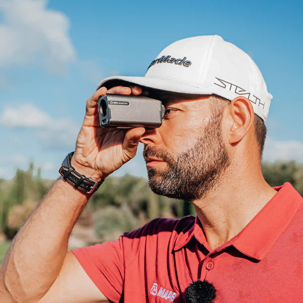 GolfBuddy aim Quantum Premium Pocket Rangefinder In Hand